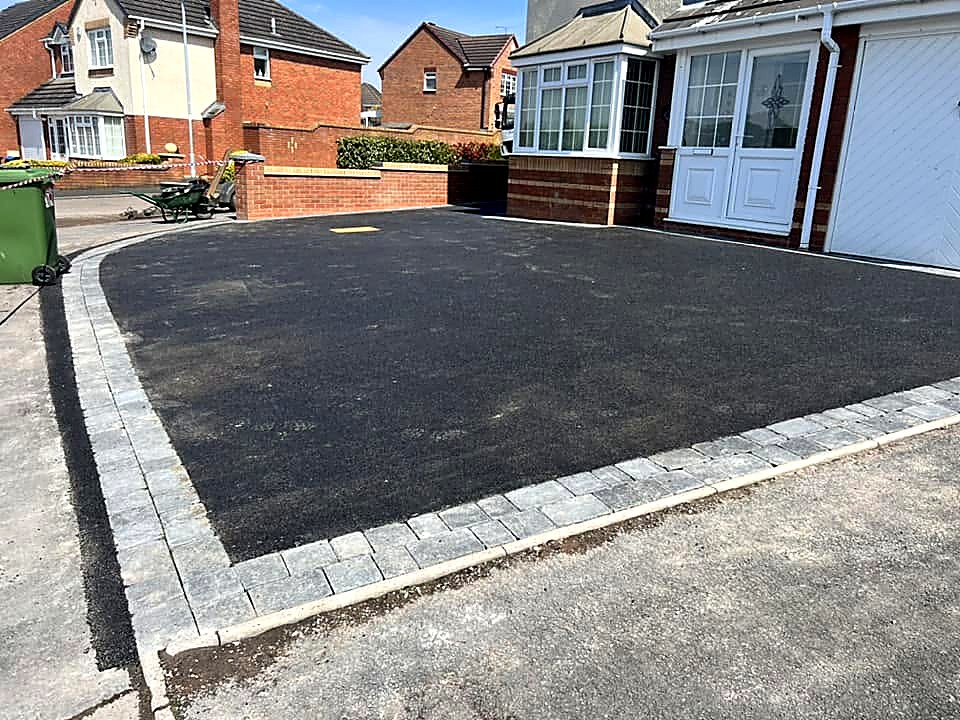 Tarmac driveway with block paving border